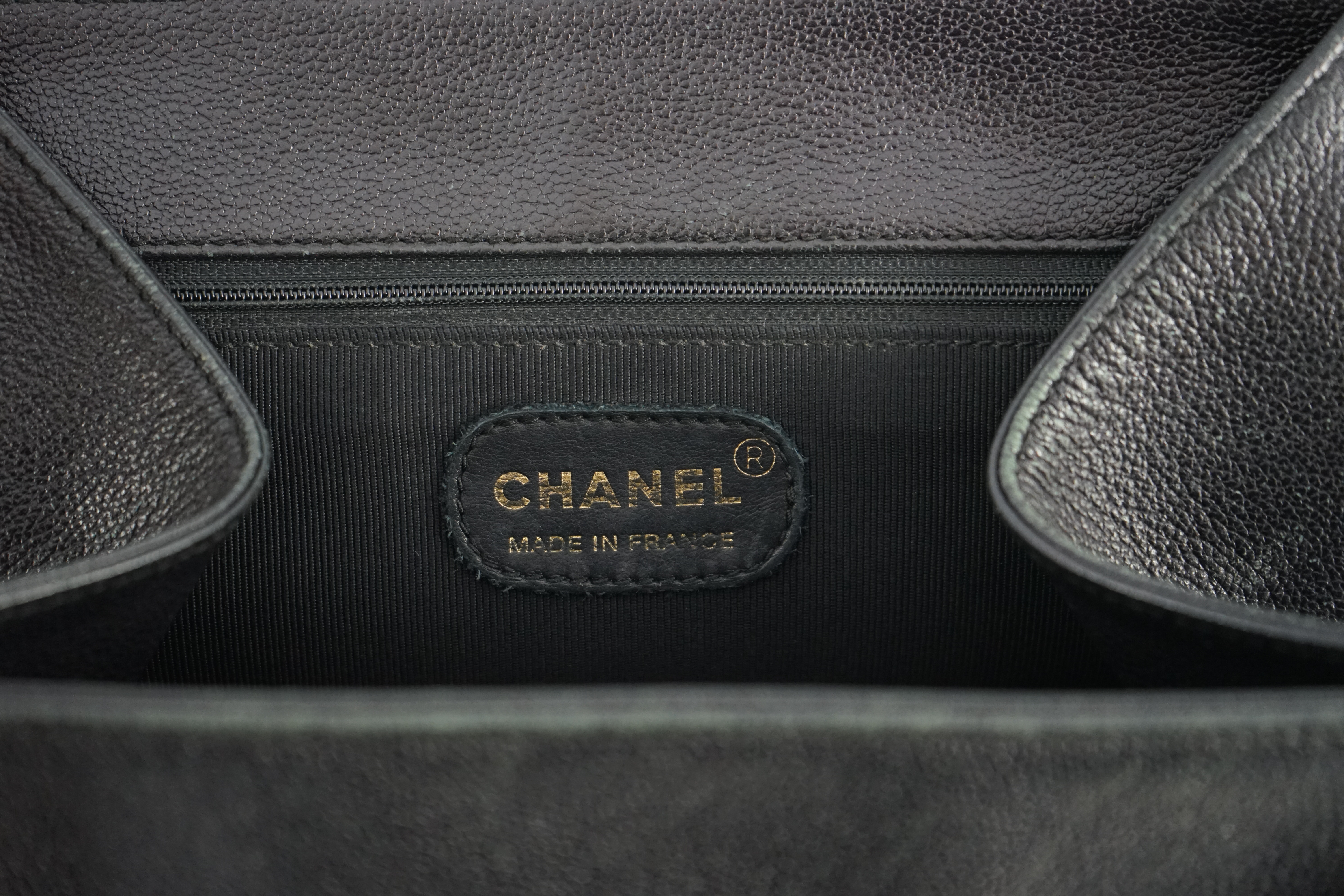 A black Chanel CC shoulder bag width 28cm, depth 17.5cm, length 19cm